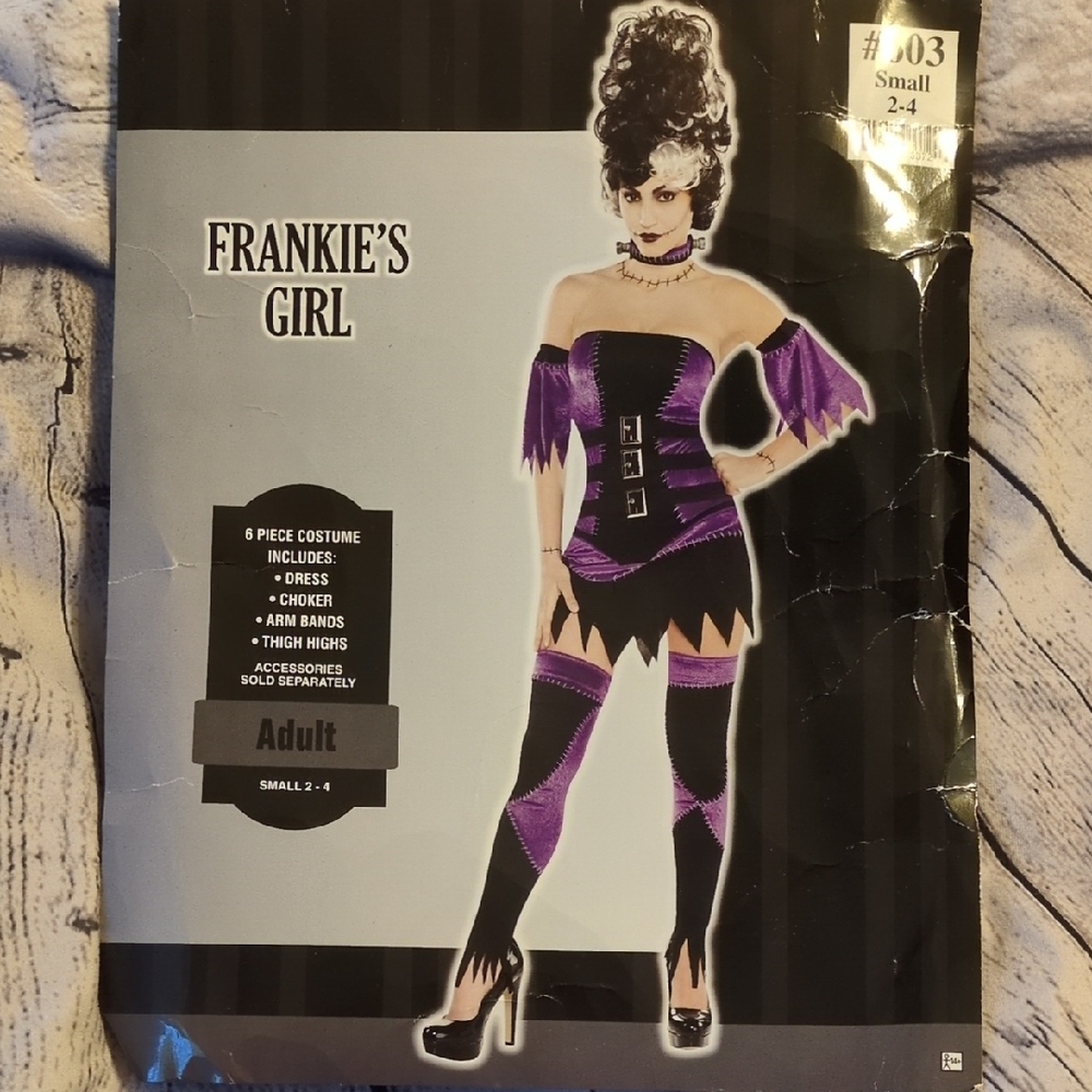 Purple and Black Halloween Costume with Gothic Design